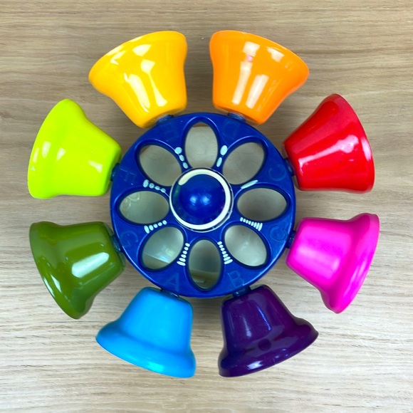B. Toys Piccolo Carousel Musical Bells